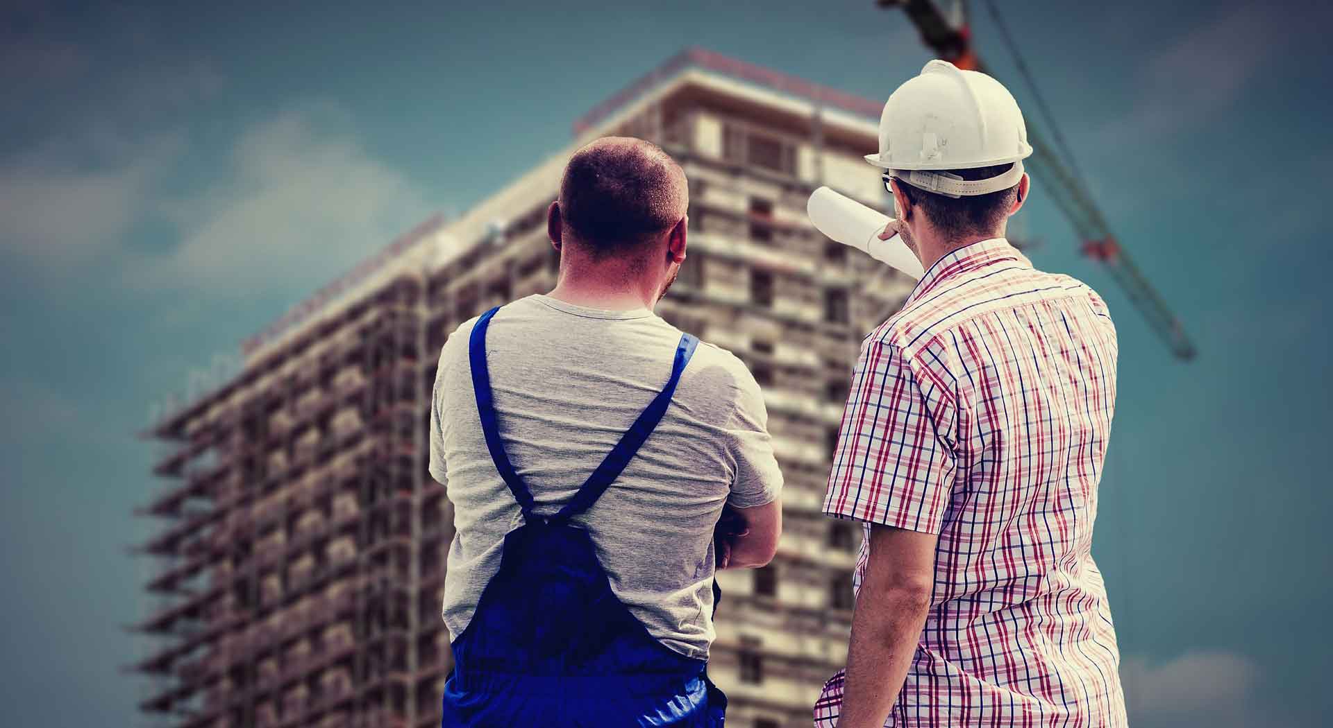 GMK Group construction team reviewing a building site